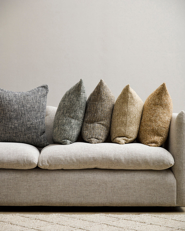 Cumbria Cushion Earthy colourways of marled yarn create the subtle tone of our Cumbria cushion. Handwoven in shades of dijon and ecru, the texture and soft mottled effect makes this a timeless piece for a grounded and restorative interior. Use as a pairin