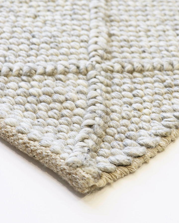 Dakota Floor Rug A staple for contemporary living, the Dakota is a superbly versatile piece. Handwoven in a classic diamond pattern, the natural straw tone and wool-blend composition brings beautiful warmth and texture to living spaces. Australian Stock B