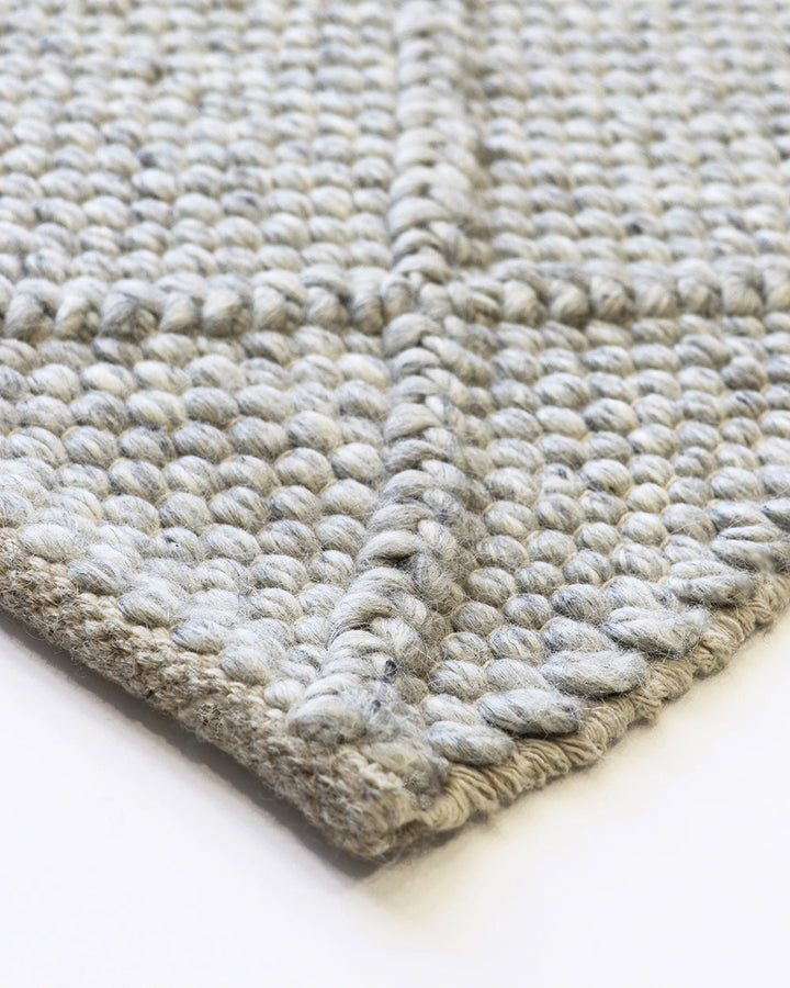 Dakota Floor Rug A staple for contemporary living, the Dakota is a superbly versatile piece. Handwoven in a classic diamond pattern, the natural straw tone and wool-blend composition brings beautiful warmth and texture to living spaces. Australian Stock B