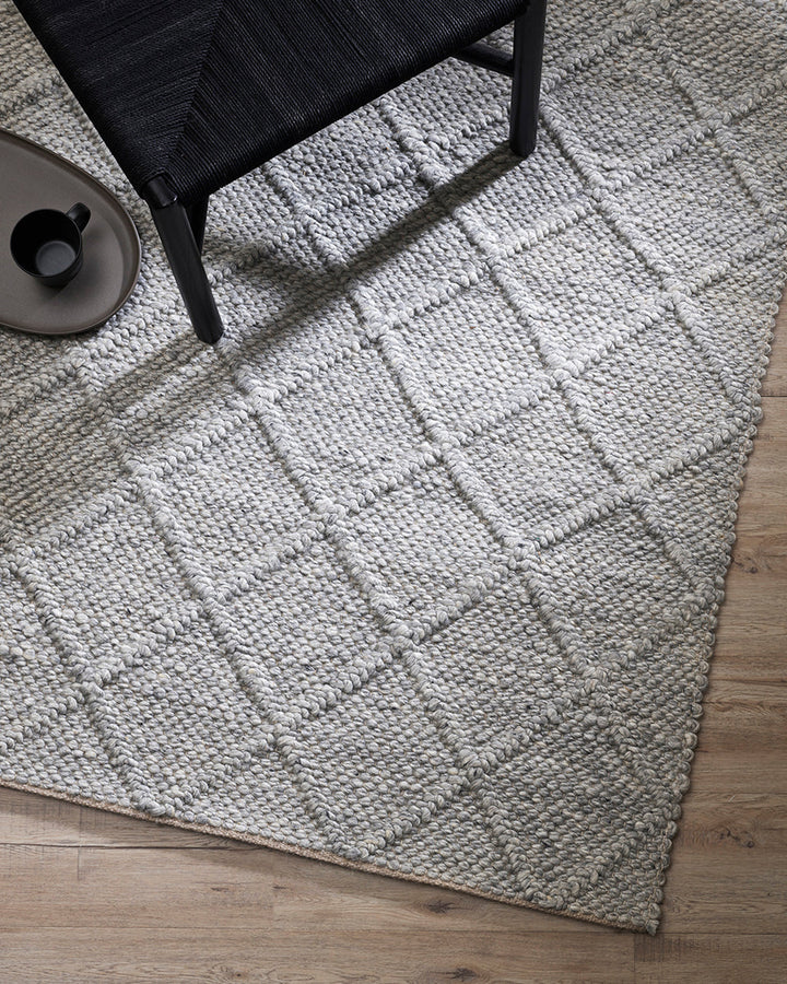 Dakota Floor Rug A staple for contemporary living, the Dakota is a superbly versatile piece. Handwoven in a classic diamond pattern, the natural straw tone and wool-blend composition brings beautiful warmth and texture to living spaces. Australian Stock B