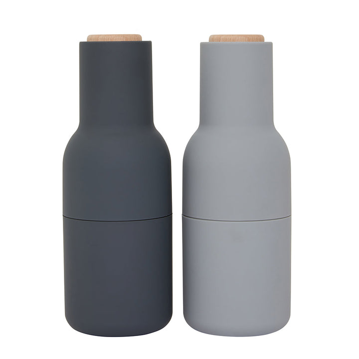Audo CPH Bottle Grinders by Audo Copenhagen - The bottle-shaped design invites a playful and experimental approach to grinding. Equipped with a robust ceramic mechanism, this grinder effortlessly handles a variety of dried spices, seeds, salt, and pepper.