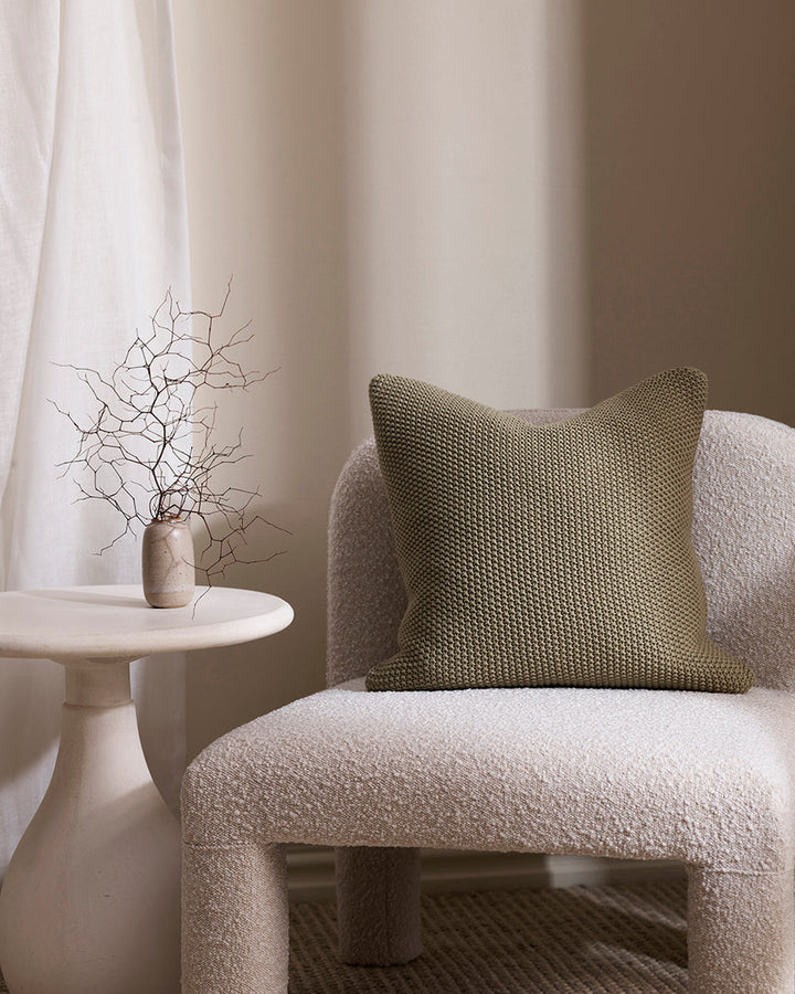 Devon Cushion Retreat into the comfort of this beautifully textured, organic cotton knit cushion. A classic and versatile accessory to any room, the soft texture and calming sage tone offers an unparalleled sense of warm, inviting style. Australian Stock