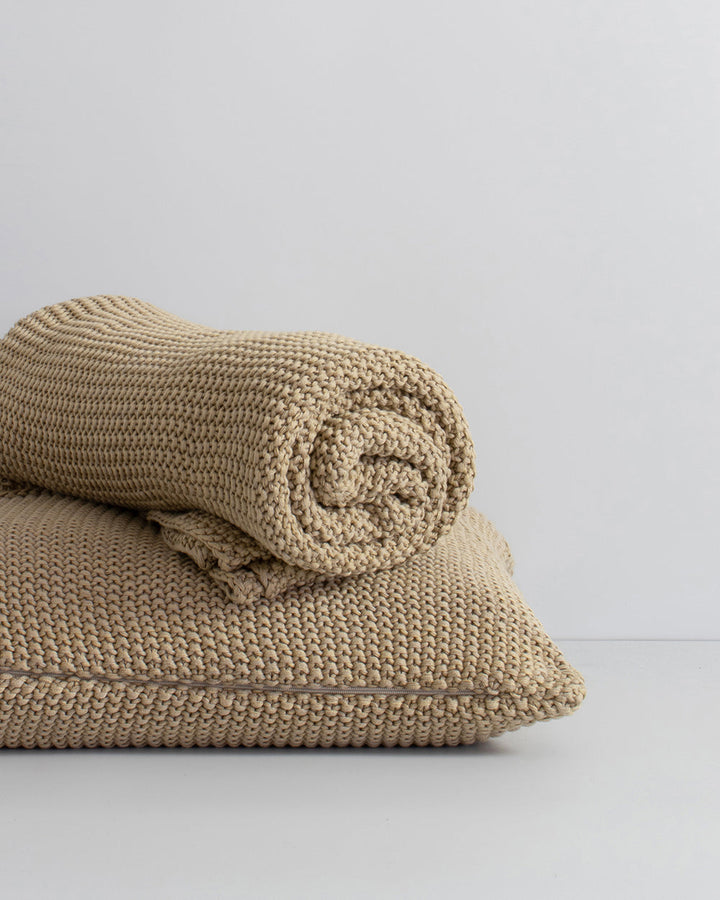 Devon Cushion Retreat into the comfort of this beautifully textured, organic cotton knit cushion. A classic and versatile accessory to any room, the soft texture and calming sage tone offers an unparalleled sense of warm, inviting style. Australian Stock