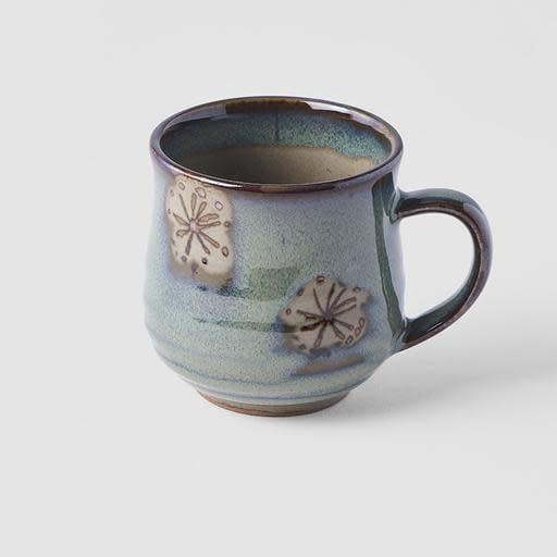 Artisan green mug with leaf design, 225ml, showcasing unique glaze and texture for a handcrafted look.