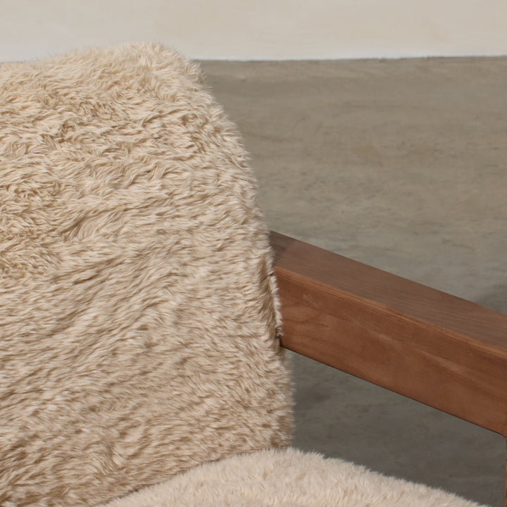 Corwin Occasional Chair Yakety Yak Our Corwin Occasional Armchair is mid-century inspired statement piece that blends sculptural elegance and grounded design. This unique upholstere chair features wooden arms that seamlessly extend into the base, eliminat