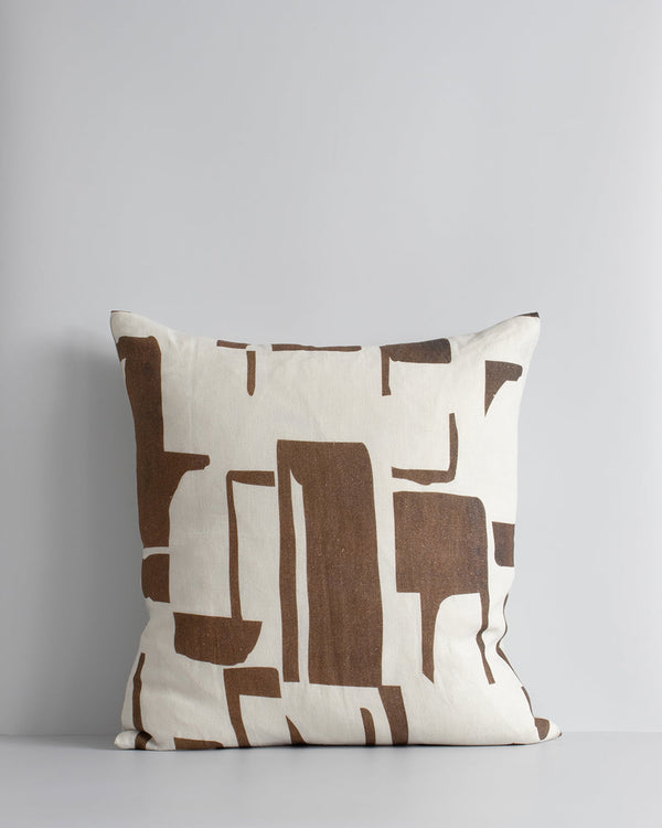 Elle Cushion Inspired by modernist forms, the design here is confident with off-beat copper shapes arranged on a pure linen base. Hand-painted by our in-house design team, this elegant and expressive cushion pairs well with brown or green-toned core produ