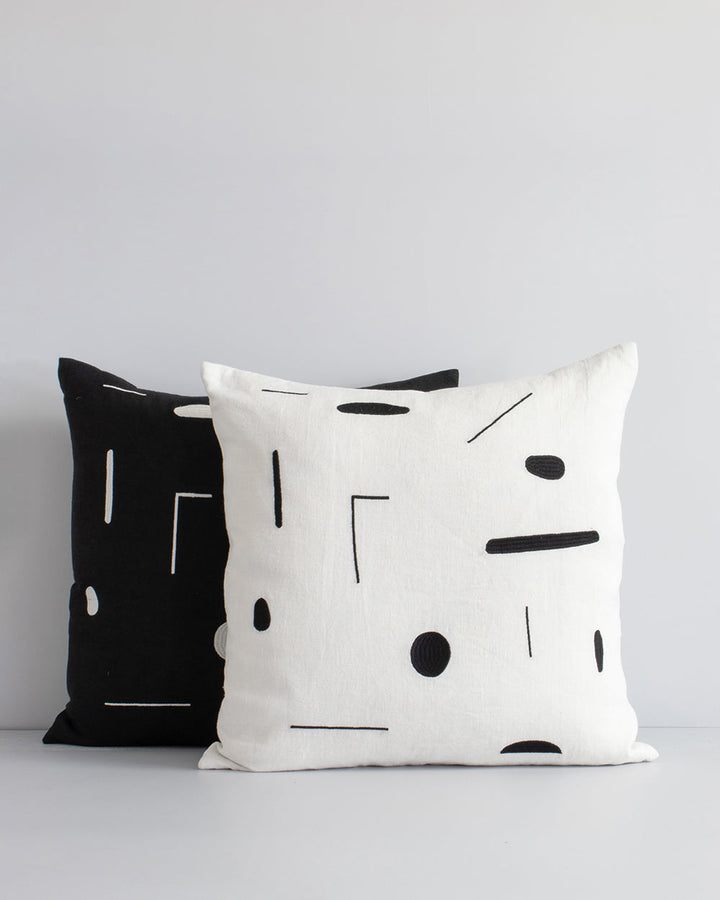 Emile Cushion Expressive, purposeful design meets our desire for stylish, contemporary living in this Joan Miro inspired design. With a nod to contemporary monochrome, minimal shapes are embroidered onto a pure linen base for a refined yet dramatic look.