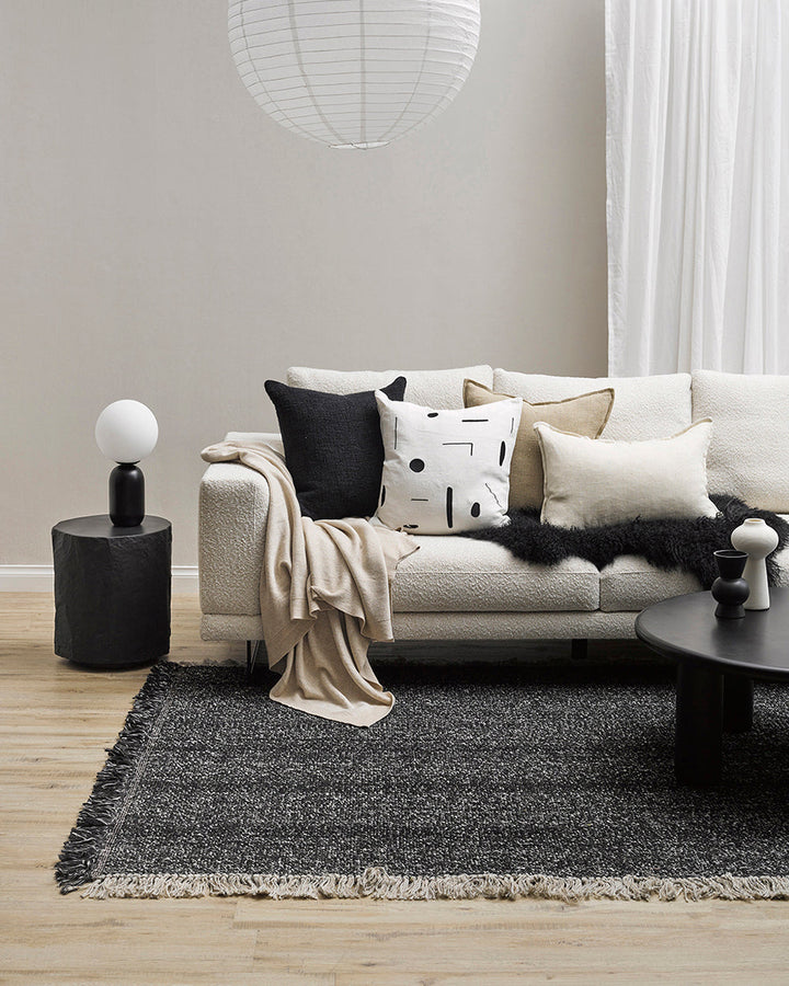 Emile Cushion Expressive, purposeful design meets our desire for stylish, contemporary living in this Joan Miro inspired design. With a nod to contemporary monochrome, minimal shapes are embroidered onto a pure linen base for a refined yet dramatic look.