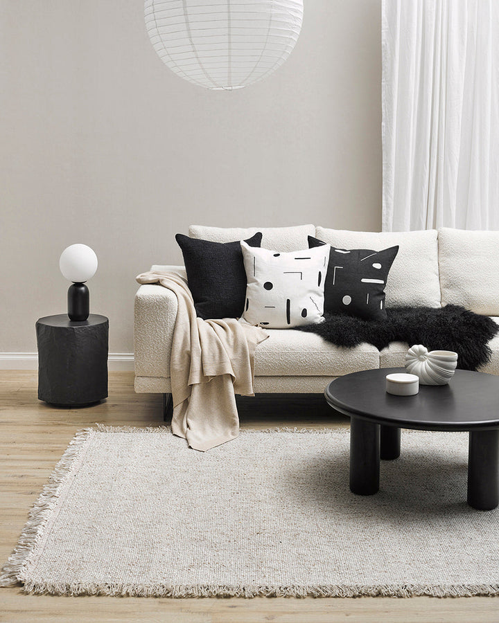 Emile Cushion Expressive, purposeful design meets our desire for stylish, contemporary living in this Joan Miro inspired design. With a nod to contemporary monochrome, minimal shapes are embroidered onto a pure linen base for a refined yet dramatic look.