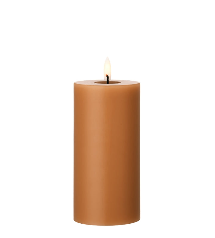 Ester & Erik LED Pillar Candle in warm brown color with lifelike glow, perfect for elegant decor and special events.