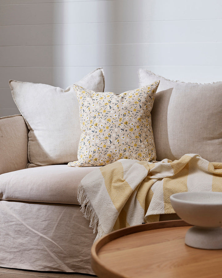 Eva Cushion Bring spring into your home with uplifting florals in soft hues of butter, white and olive. Drawing inspiration from cottage aesthetics, Eve features a delicate pattern of small flowers, leaves and tiny twigs screen-printed onto a fresh cotton