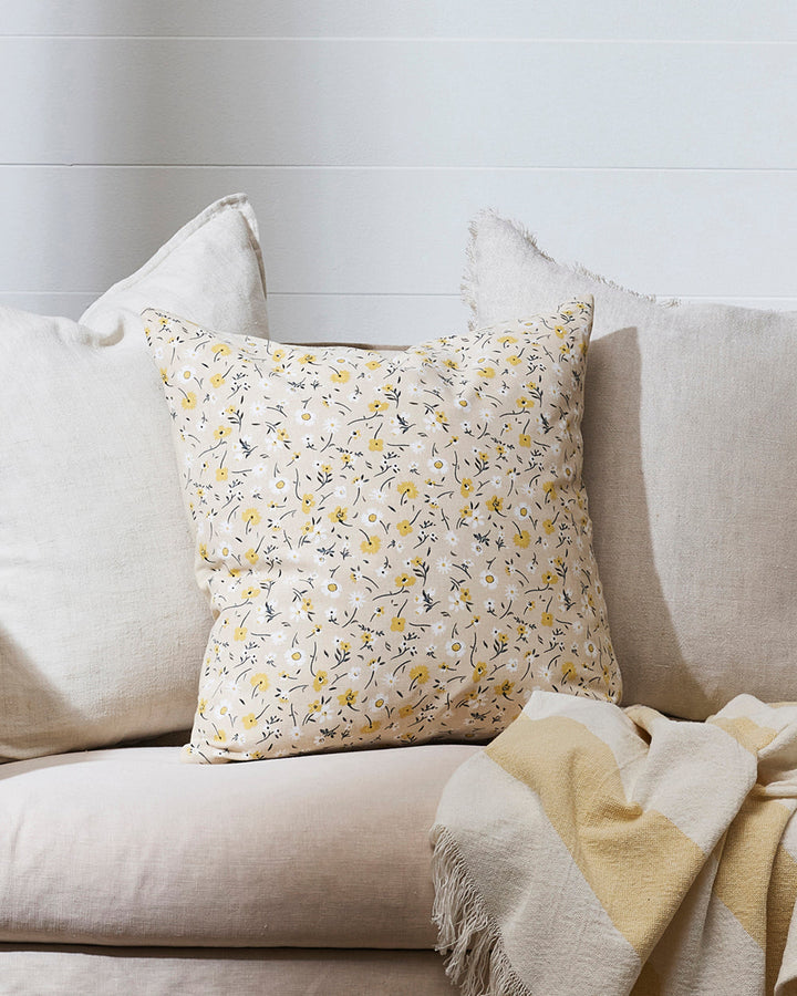 Eva Cushion Bring spring into your home with uplifting florals in soft hues of butter, white and olive. Drawing inspiration from cottage aesthetics, Eve features a delicate pattern of small flowers, leaves and tiny twigs screen-printed onto a fresh cotton