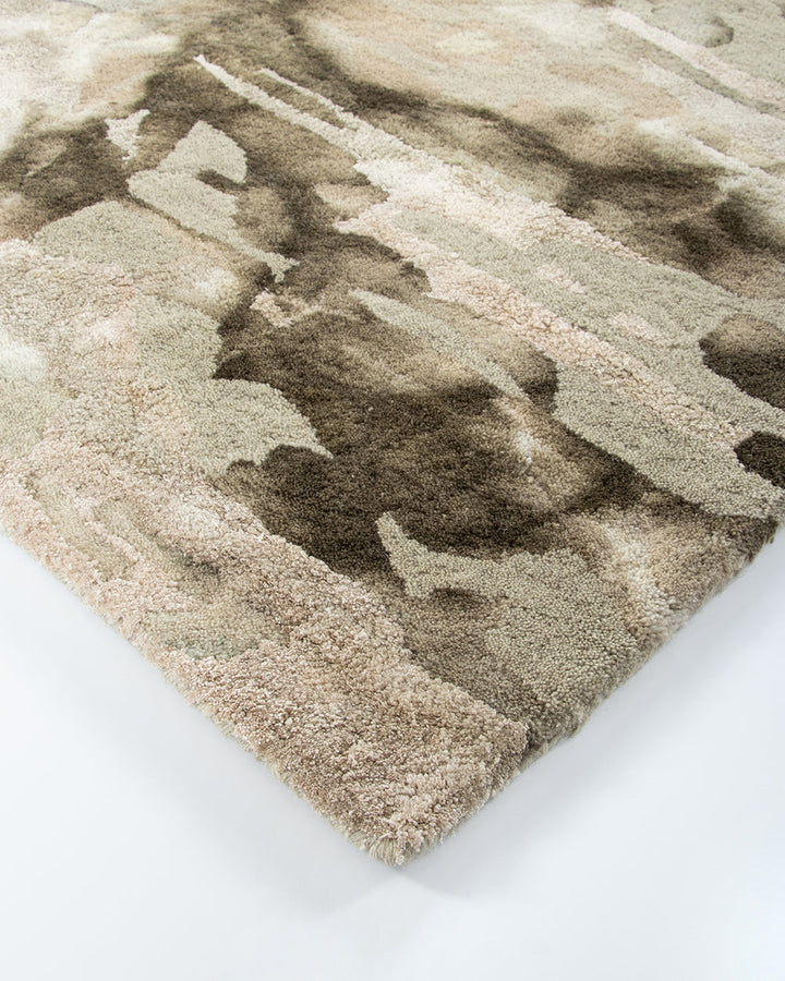 Fayette Floor Rug Add a stunning focal point to your space with the distinct design of Fayette. Inspired by forms in nature, the unique patterning is achieved through a specialised over-dyeing process applied to a handtufted base. Handwoven in a soft wool