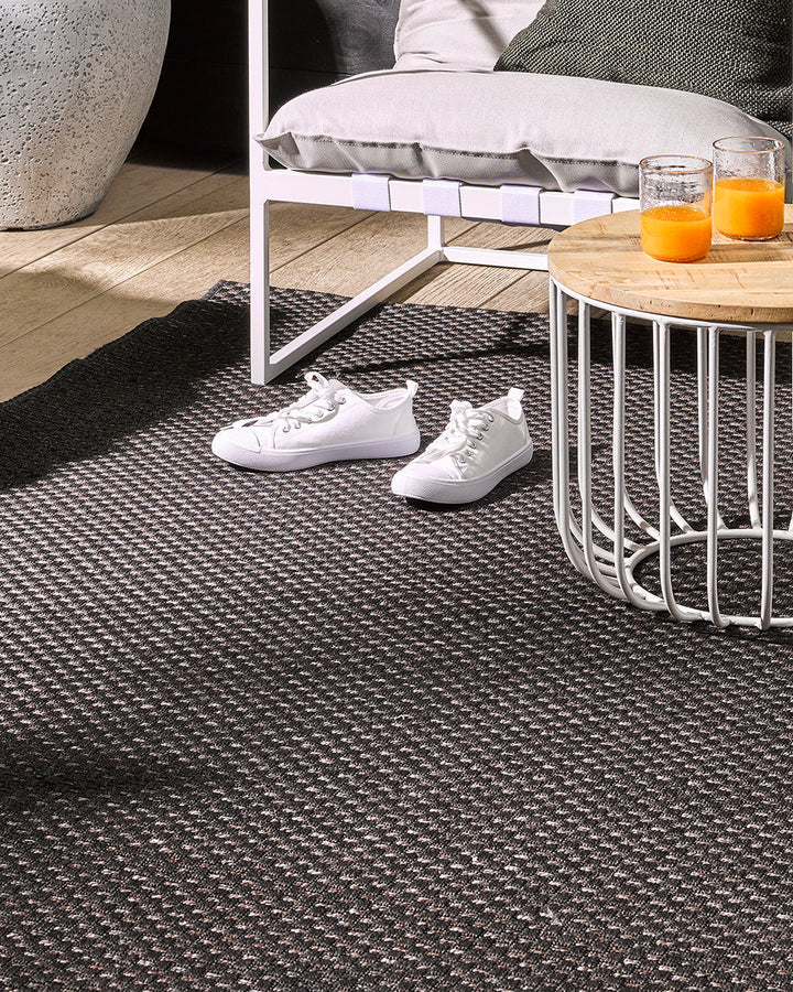 Flax Floor Rug The attractive basket-weave texture and golden tone of the Flax rug provides a great base for entertaining areas. The simple, textural design makes this piece easy to pair with flooring, furniture, and soft furnishings. Suitable for use in