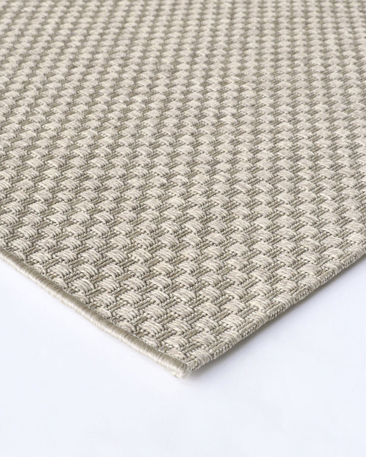 Flax Floor Rug The attractive basket-weave texture and golden tone of the Flax rug provides a great base for entertaining areas. The simple, textural design makes this piece easy to pair with flooring, furniture, and soft furnishings. Suitable for use in