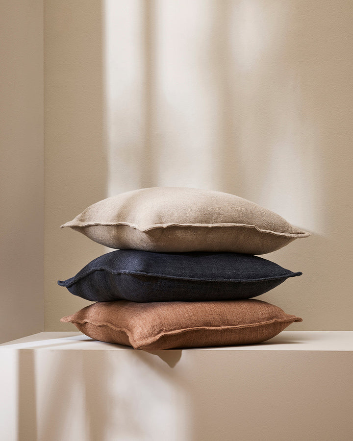 Flaxmill Cushion Enduringly beautiful, the heavy-weight weave of the Flaxmill celebrates the natural texture of raw linen fibres. Featuring a 1cm flange edge, the warm nude tone accentuates its textural qualities and brings an organic, contemporary feel t