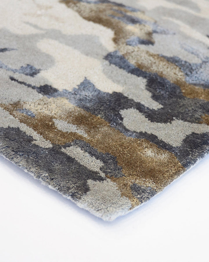 Fleur Floor Rug Embrace contemporary luxury with the bold beauty of our Fleur floor rug. Handtufted from a blend of wool and viscose, this piece creates a dramatic space with its rich colour, abstract pattern and soft underfoot texture. Emphasise featured