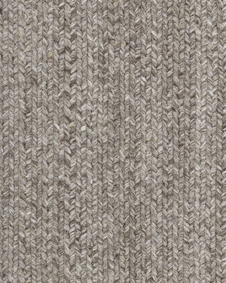 Flinders Floor Rug Indulge in the beauty of understated design. Flinders features a gently mottled texture, handbraided into a subtle linear pattern with mitre point corners. Handcrafted by skilled artisans, the sustainable PET composition is soft and dur