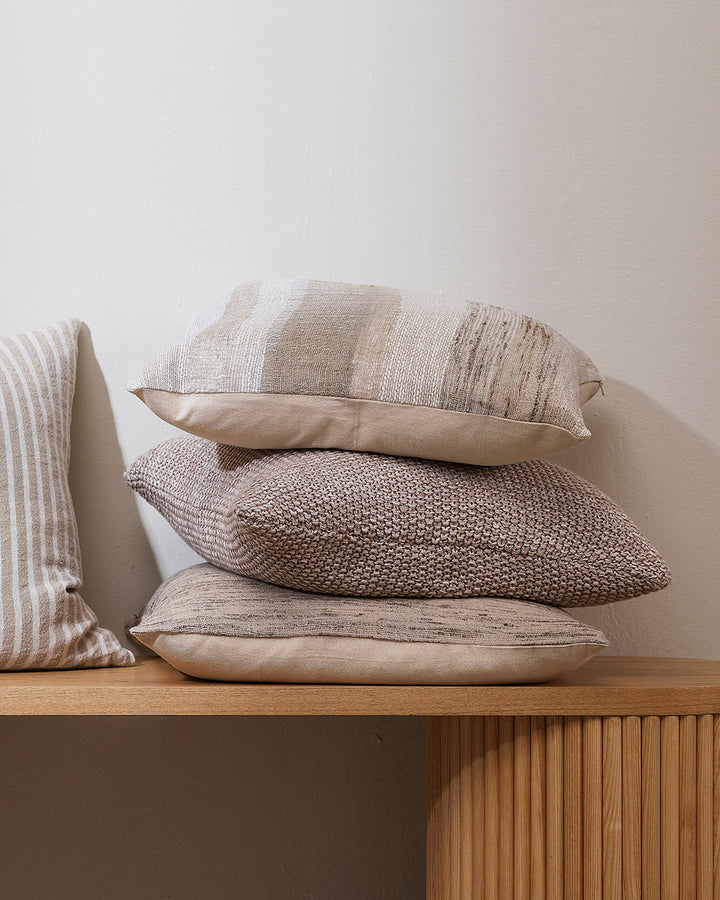 Floyd Cushion Simplicity reigns supreme in the beautifully pared-back design of our Floyd cushion. Raw, slubby linen is blended with cotton and silk to create a tactile pattern of fine stripes. The natural colourway pairs perfectly with our Woodrow cushio