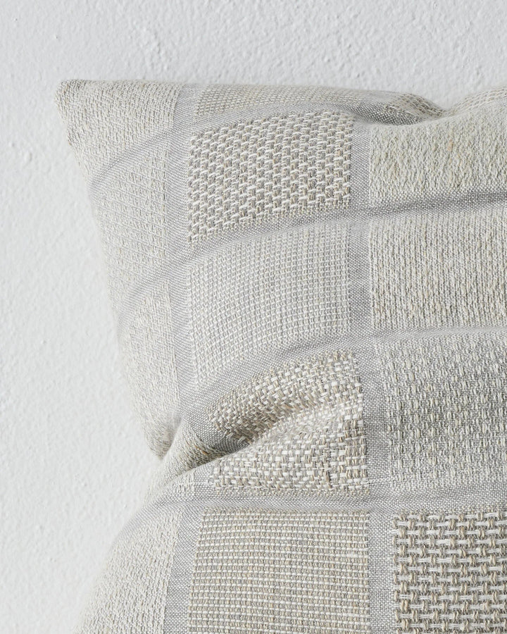 Bodrum Mist A contemporary, woven linen interpretation of a geometric checkerboard. Featuring panels of varied weave structures and subtle colour variations.The blend of soft, tonal yarns in Bodrum creates a textured feel. Colourway Mist identifies with o