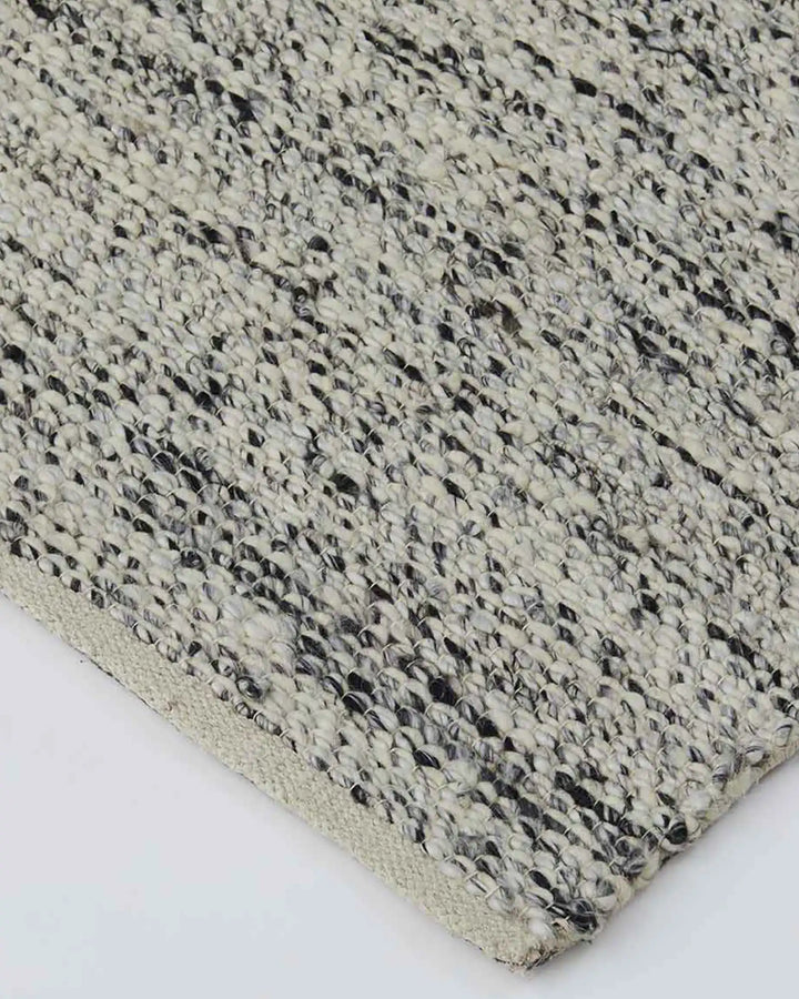 Dolomite Pepper - Ethically Hand-Woven Exquisite Rug Discover the Dolomite Pepper rug, beautifully hand-woven for any interior. Soft, stylish, and perfect for living areas.
