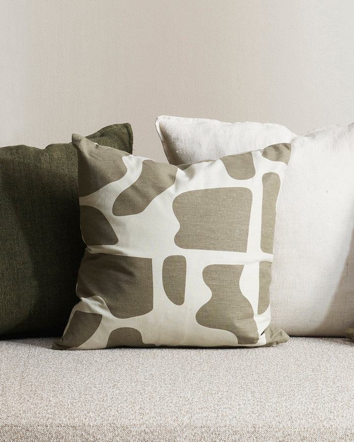 Harper Cushion A fun, geometric piece, Harper takes inspiration from bold 1950's patterns. Hand-cut forms are screen-printed in olive onto a soft, cotton-linen base. The double-sided design, pairs beautifully with Matteo Moss and Cyprian Oatmeal. Australi