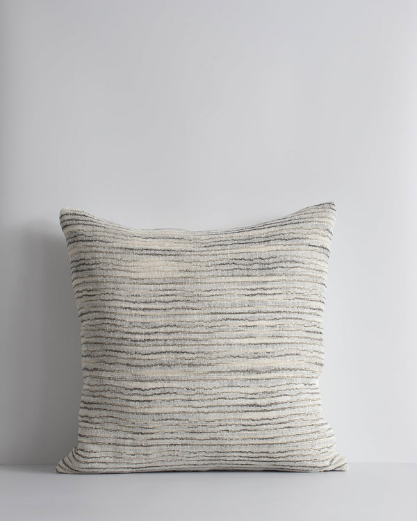 Himawari Cushion Simplicity reigns supreme in our beautifully pared-back Himawari cushion. Raw, slubby linen is handwoven into irregular fine charcoal stripes, while calm, natural tones and subtle surface texture creates a restful and restorative space. A