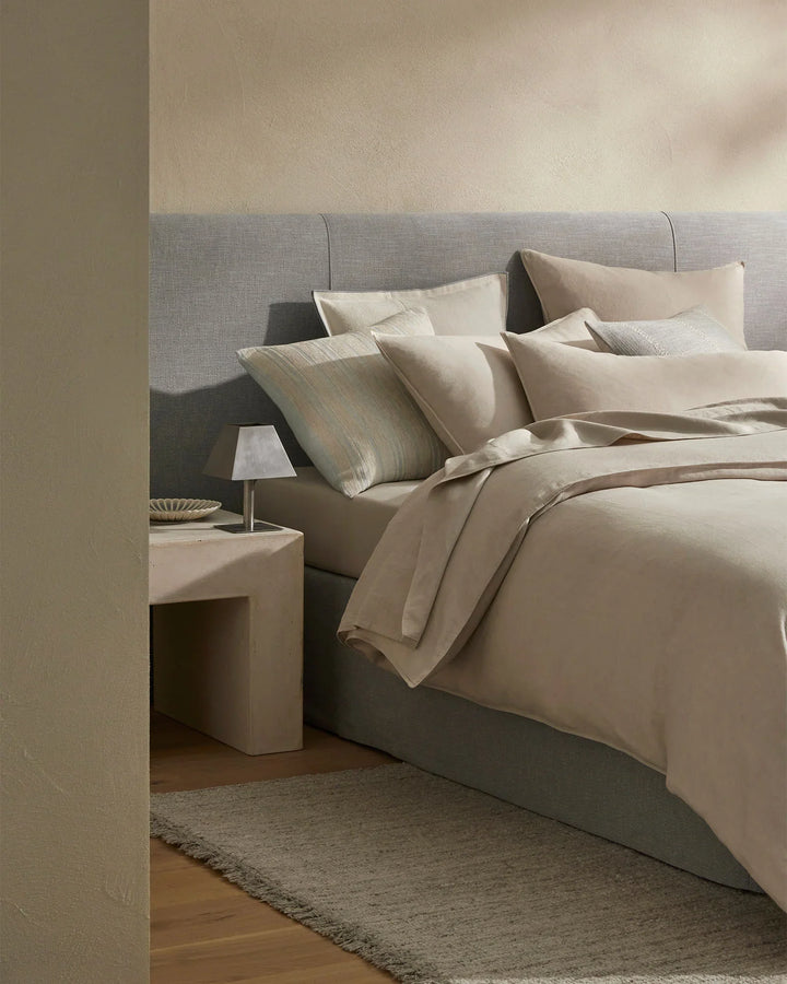 Adriana Glacier A woven mix of lustrous chenille and dry natural fibres gives Adriana a chic finish and luxe feel. A palette that heros modern, essential, on-trend hues. Glacier combines sky blue with a contrasting sandstone stripe.Timeless and classic in