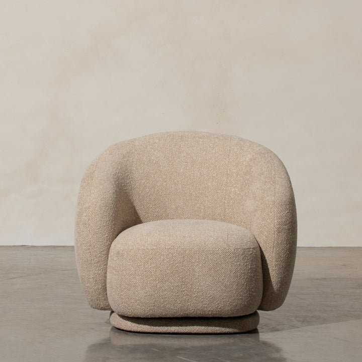 Aslan Occasional Chair Beige Immerse yourself in the plush embrace of our Aslan Occasional Chair and its soft, textured fabric and sink into a world of unmatched relaxation. The neutral tones and gracefully curved design contribute to a timeless yet uniqu