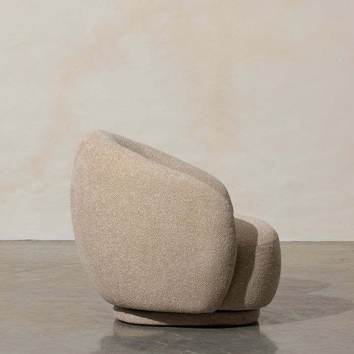 Aslan Occasional Chair Beige Immerse yourself in the plush embrace of our Aslan Occasional Chair and its soft, textured fabric and sink into a world of unmatched relaxation. The neutral tones and gracefully curved design contribute to a timeless yet uniqu