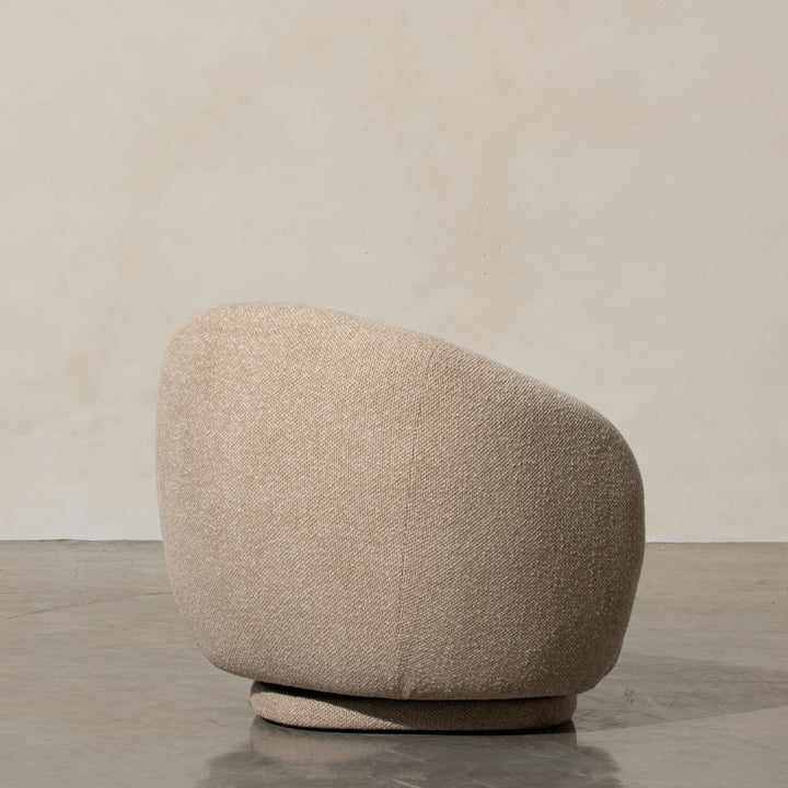 Aslan Occasional Chair Beige Immerse yourself in the plush embrace of our Aslan Occasional Chair and its soft, textured fabric and sink into a world of unmatched relaxation. The neutral tones and gracefully curved design contribute to a timeless yet uniqu