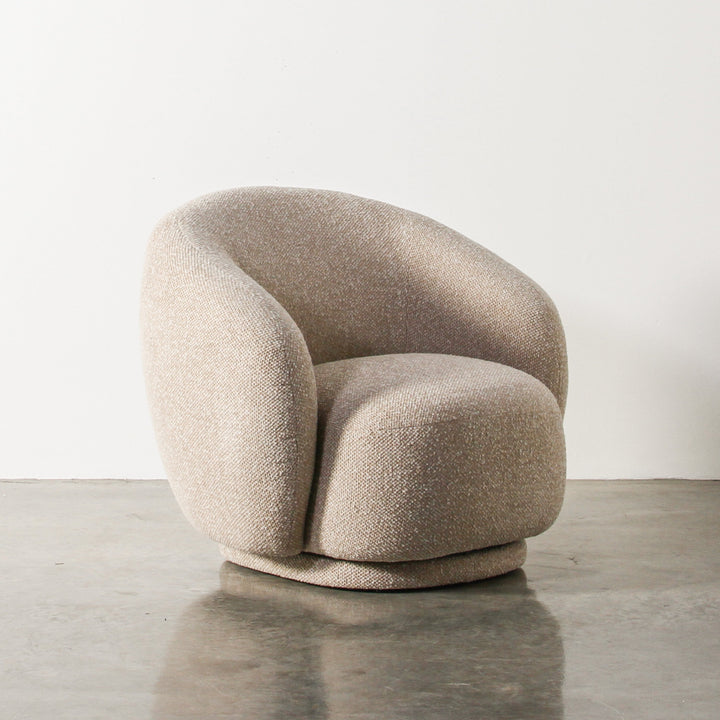 Aslan Occasional Chair Beige Immerse yourself in the plush embrace of our Aslan Occasional Chair and its soft, textured fabric and sink into a world of unmatched relaxation. The neutral tones and gracefully curved design contribute to a timeless yet uniqu