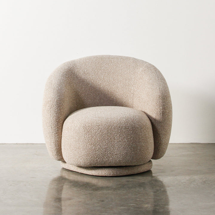 Aslan Occasional Chair Beige Immerse yourself in the plush embrace of our Aslan Occasional Chair and its soft, textured fabric and sink into a world of unmatched relaxation. The neutral tones and gracefully curved design contribute to a timeless yet uniqu