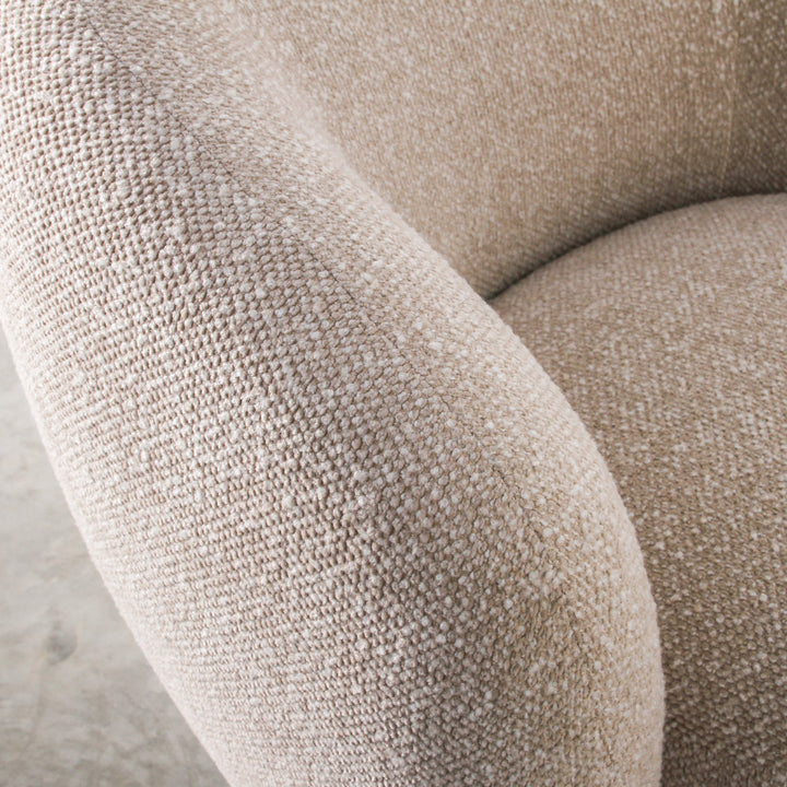 Aslan Occasional Chair Beige Immerse yourself in the plush embrace of our Aslan Occasional Chair and its soft, textured fabric and sink into a world of unmatched relaxation. The neutral tones and gracefully curved design contribute to a timeless yet uniqu