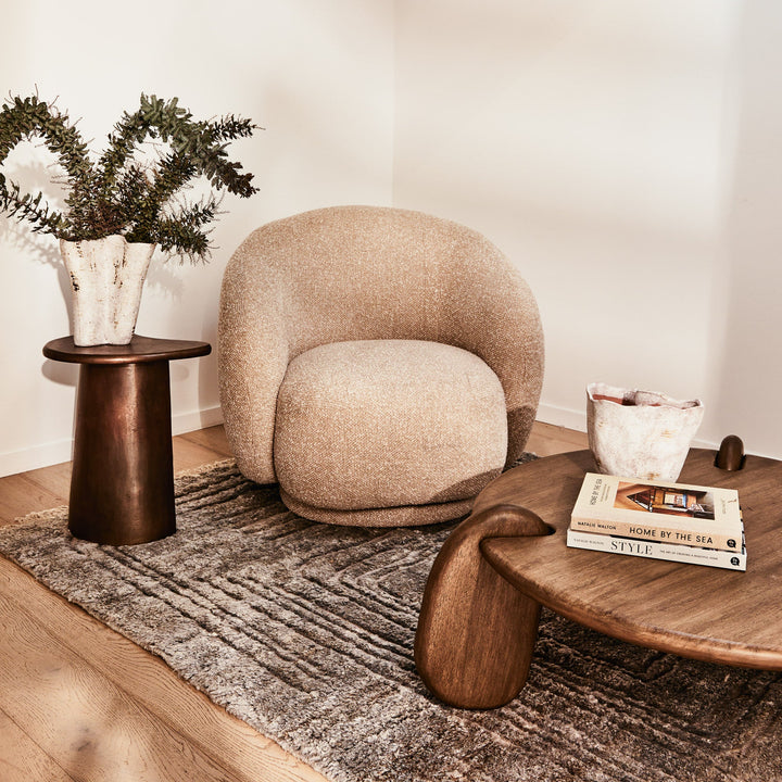 Aslan Occasional Chair Beige Immerse yourself in the plush embrace of our Aslan Occasional Chair and its soft, textured fabric and sink into a world of unmatched relaxation. The neutral tones and gracefully curved design contribute to a timeless yet uniqu