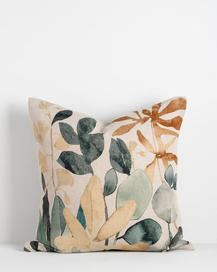 Imogen Cushion Botanical beauty is celebrated in the uplifting design of our Imogen cushion. Screen-printed onto a natural cotton base, overlaid cut-outs reminiscent of pressed flowers create a vibrant interplay of colour and shape. Warm tones of brass an