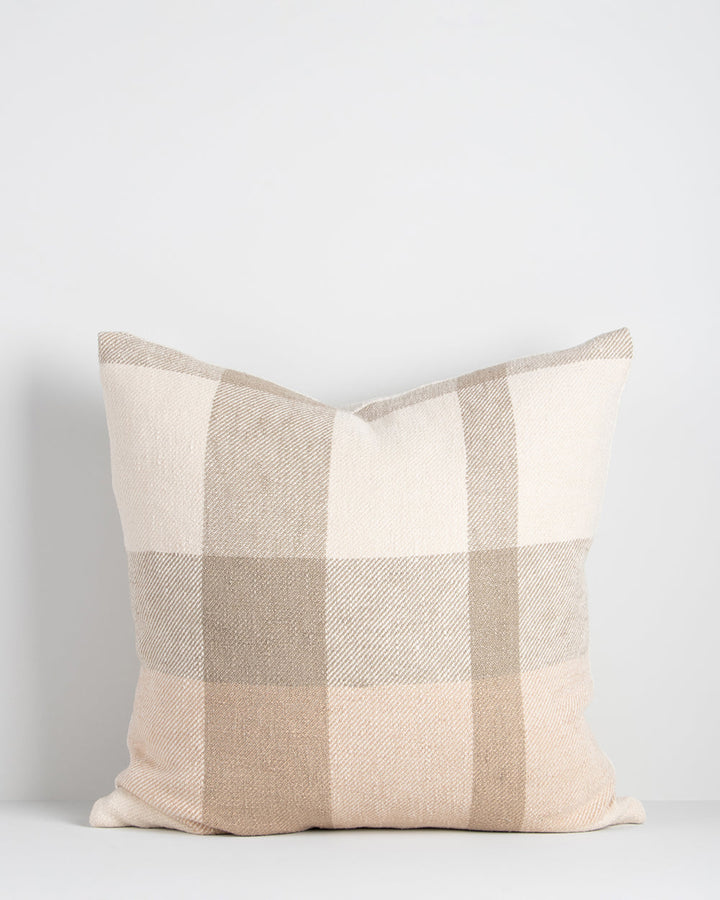 Jefferson Cushion Country charm is reinterpreted for urban living in the contemporary design of the Jefferson. Tones of cumin, ivory and tobacco are woven into an offset, oversized plaid design, embodying the modern country trend. Crafted from a thick cot