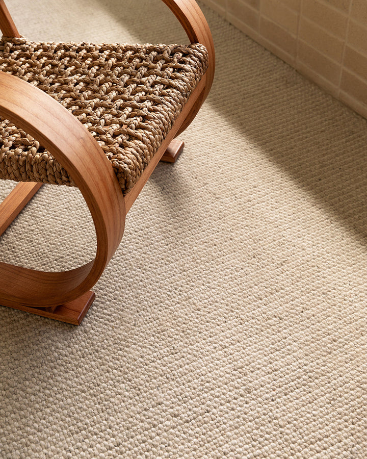 Kansas Floor Rug Bring a serene, welcoming feel to your home with the beauty of our Kansas floor rug. Handwoven in a two-tone blend of yarns, the simple 1-1 weave and soft oyster tones make this an easy choice for relaxed and minimal interiors. Australian