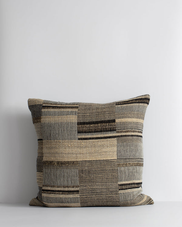 Kentucky Cushion Constructed from sections of artisanal woven fabric, the Kentucky is handcrafted using a stunning blend of wild tussar silk and spun wool. Celebrating natural fibres, this cushion brings a raw and rustic beauty to a space. Pair with clean