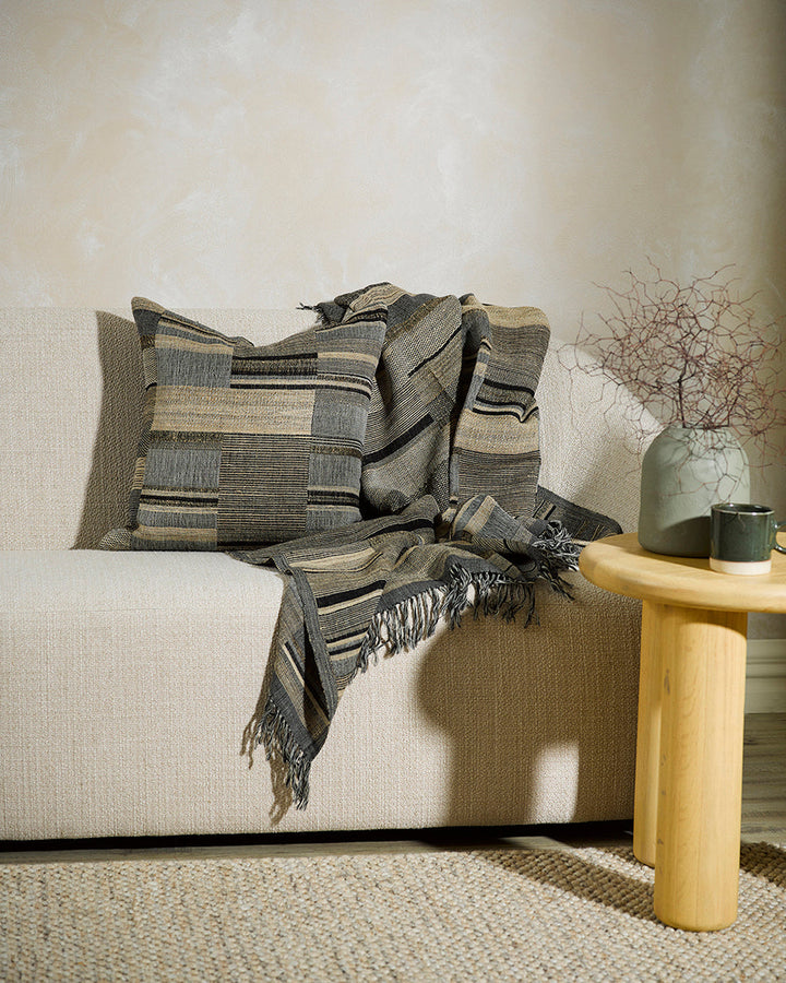 Kentucky Cushion Constructed from sections of artisanal woven fabric, the Kentucky is handcrafted using a stunning blend of wild tussar silk and spun wool. Celebrating natural fibres, this cushion brings a raw and rustic beauty to a space. Pair with clean