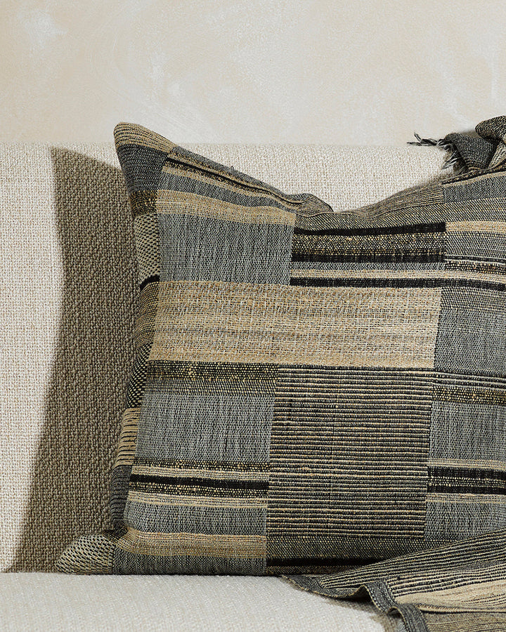 Kentucky Cushion Constructed from sections of artisanal woven fabric, the Kentucky is handcrafted using a stunning blend of wild tussar silk and spun wool. Celebrating natural fibres, this cushion brings a raw and rustic beauty to a space. Pair with clean