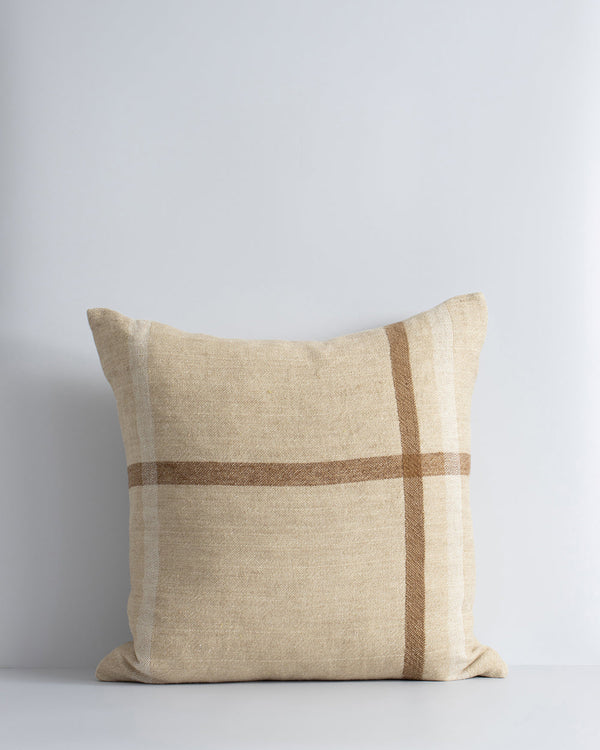 Keswick Cushion Country charm is reinterpreted for urban living in the pared-back design of our Keswick cushion. Tones of treacle, ivory and taupe are woven into an offset, oversized plaid, embodying the â€˜Rustic Retreatâ€™ trend. Comfort and quality go