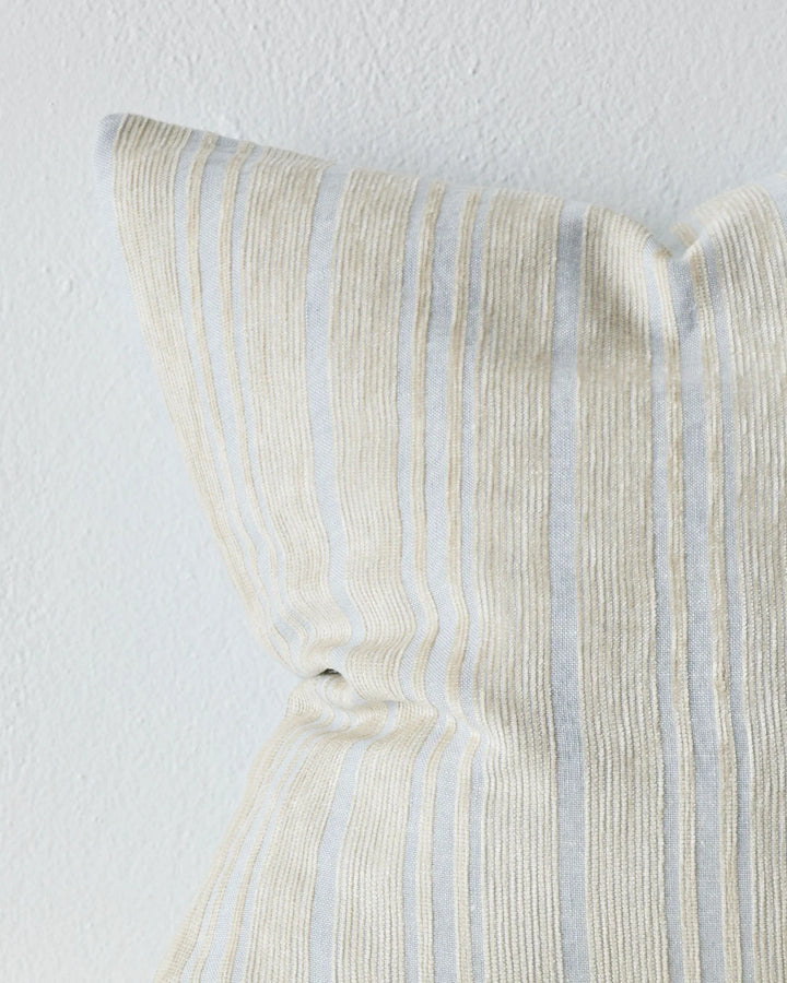 Adriana Glacier A woven mix of lustrous chenille and dry natural fibres gives Adriana a chic finish and luxe feel. A palette that heros modern, essential, on-trend hues. Glacier combines sky blue with a contrasting sandstone stripe.Timeless and classic in