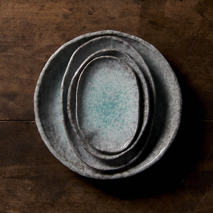 Oval Ceramic Plate in Aqua Splash Blue Glossy with Irregular Rim