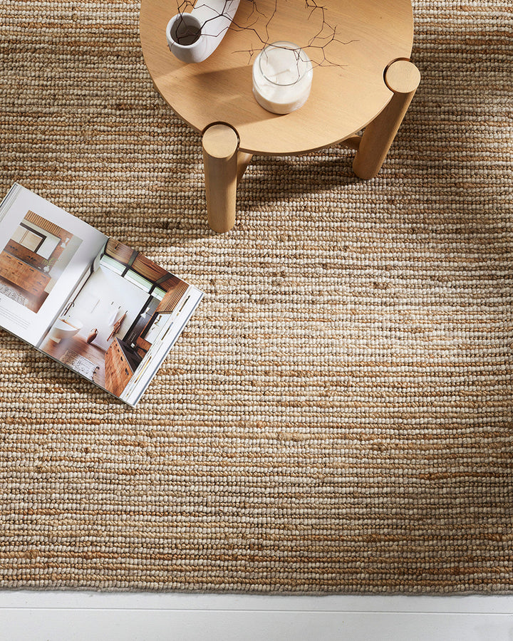 Lima Floor Rug Invite simple, raw texture into your space with the beauty of natural fibres. Handwoven from a stunning blend of jute and wool, the Lima features a stripe pattern in a striking charcoal colourway. An excellent all-rounder for a wide range o