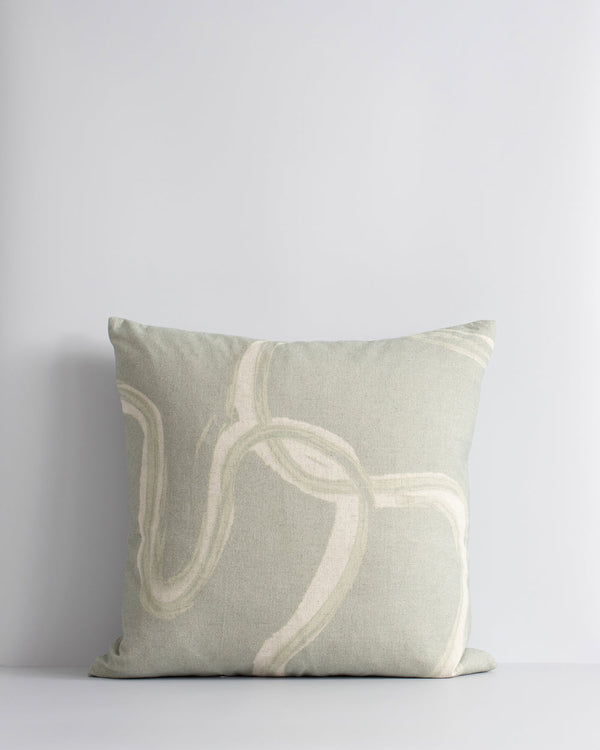 Machu Cushion A mindful, harmonious way of living is reflected in the design of this lichen-toned cushion. The flow of nature is depicted with subtle painterly lines, hand-drawn onto a linen-cotton base. Pair with ecru and moss tones to create a serene an