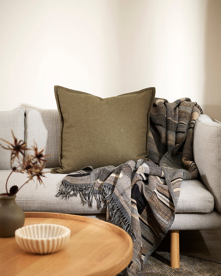 Maximus Cushion Pared-back design and a natural earthy tone gives Maximus a warm, organic look. Crafted from a blend of densely felted wool, this generous cushion offers a balanced, harmonious way of living. Australian Stock Buy at beon.com.au