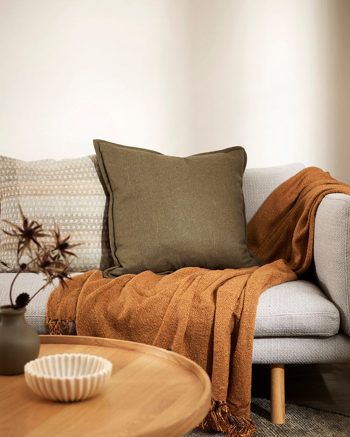 Maximus Cushion Pared-back design and a natural earthy tone gives Maximus a warm, organic look. Crafted from a blend of densely felted wool, this generous cushion offers a balanced, harmonious way of living. Australian Stock Buy at beon.com.au