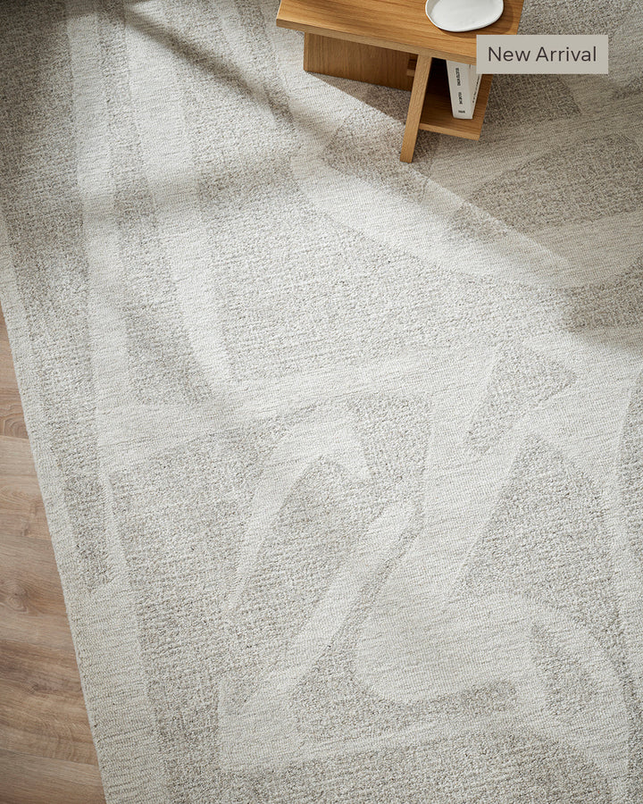 Maya Floor Rug Create a welcoming space with understated design in pure 100% wool. Inspired by the mineral lines in coastal rocks, the Maya rug’s abstract design and sand tones evoke a natural sense of warmth and style. Soft and supportive underfoot, the