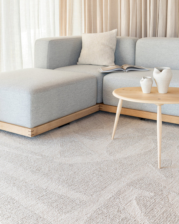 Maya Floor Rug Create a welcoming space with understated design in pure 100% wool. Inspired by the mineral lines in coastal rocks, the Maya rug’s abstract design and sand tones evoke a natural sense of warmth and style. Soft and supportive underfoot, the